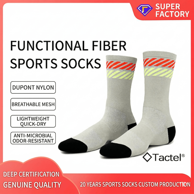 Gray sports socks with colorful stripes on a white background, featuring Tactel branding.